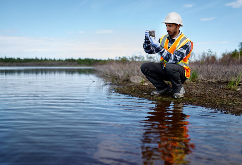 Man testing water at lake 1000x650 150 dpi AdobeStock_307688076