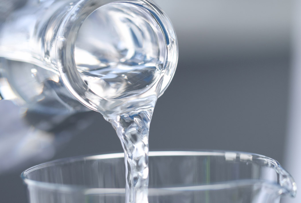 Water from beaker cropped and smaller AdobeStock_447775197