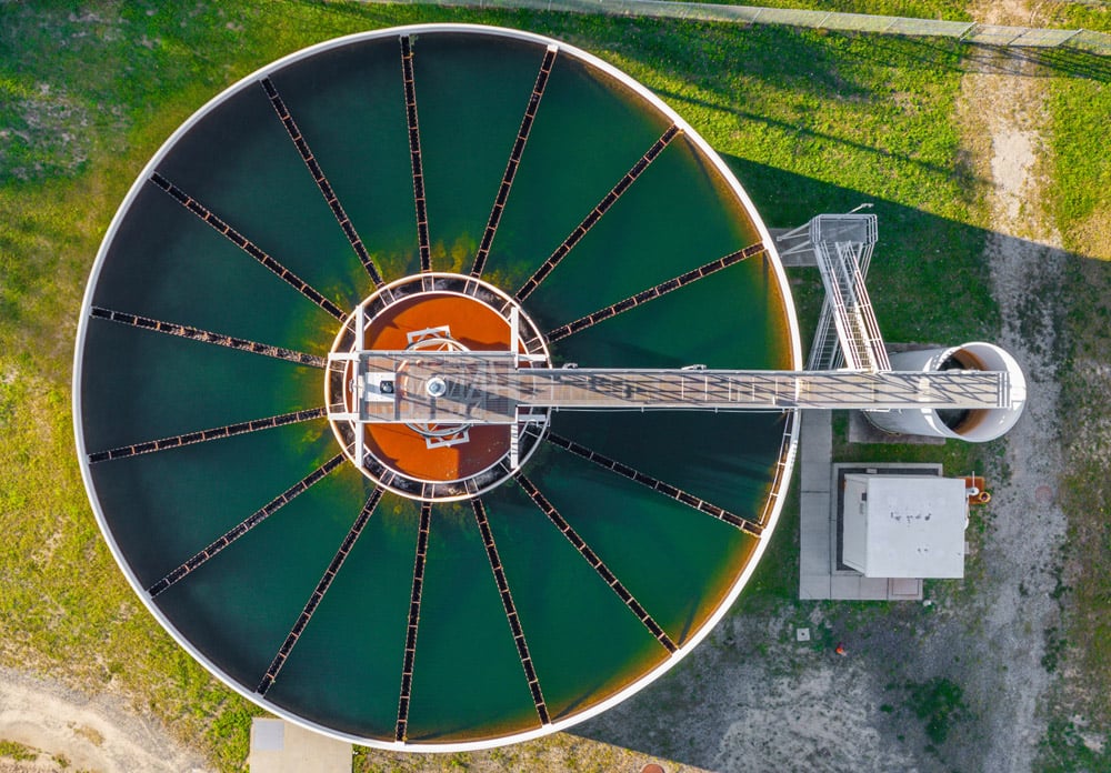 darker green tank with grass at wastewater 1000px x 700px 100dpi